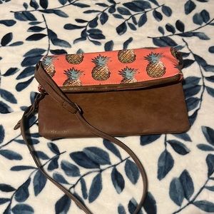 Crossbody pineapple and leather bag. Unsure of brand.